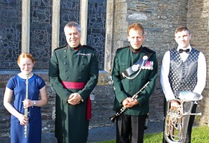 All smiles from 12 year old Maia Roberts from Helston, Major Peter Clark - Musical Director, WO2 Bob Ghigi - Bandmaster and 17 year Gregory Graves from Callington. Maia and Gregory were given the unique opportunity of taking part in a concert given by The Waterloo Band and Bugles of the Rifles. Picture by Chris Cox BOCC20150525A-002_C